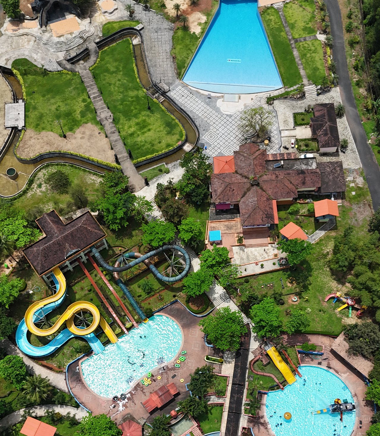 Manasa Water Park Resort is a perfect getaway for families, friends, and adventure seekers visiting Mangalore. Featuring thrilling water slides, spacious swimming pools, and comfortable resort accommodations, the park combines fun, relaxation, and coastal charm in one destination. Guests can enjoy a variety of activities including poolside relaxation, water adventures, and beachfront leisure. The resort also offers multipurpose halls, open lawns, and amphitheatres, making it ideal for events, parties, and celebrations. With safe and clean facilities, along with affordable packages, Manasa Water Park Resort ensures an unforgettable coastal experience for all ages. Highlights: Water park with slides and pools Family-friendly resort accommodations Multipurpose AC hall, open lawn, and amphitheatre for events